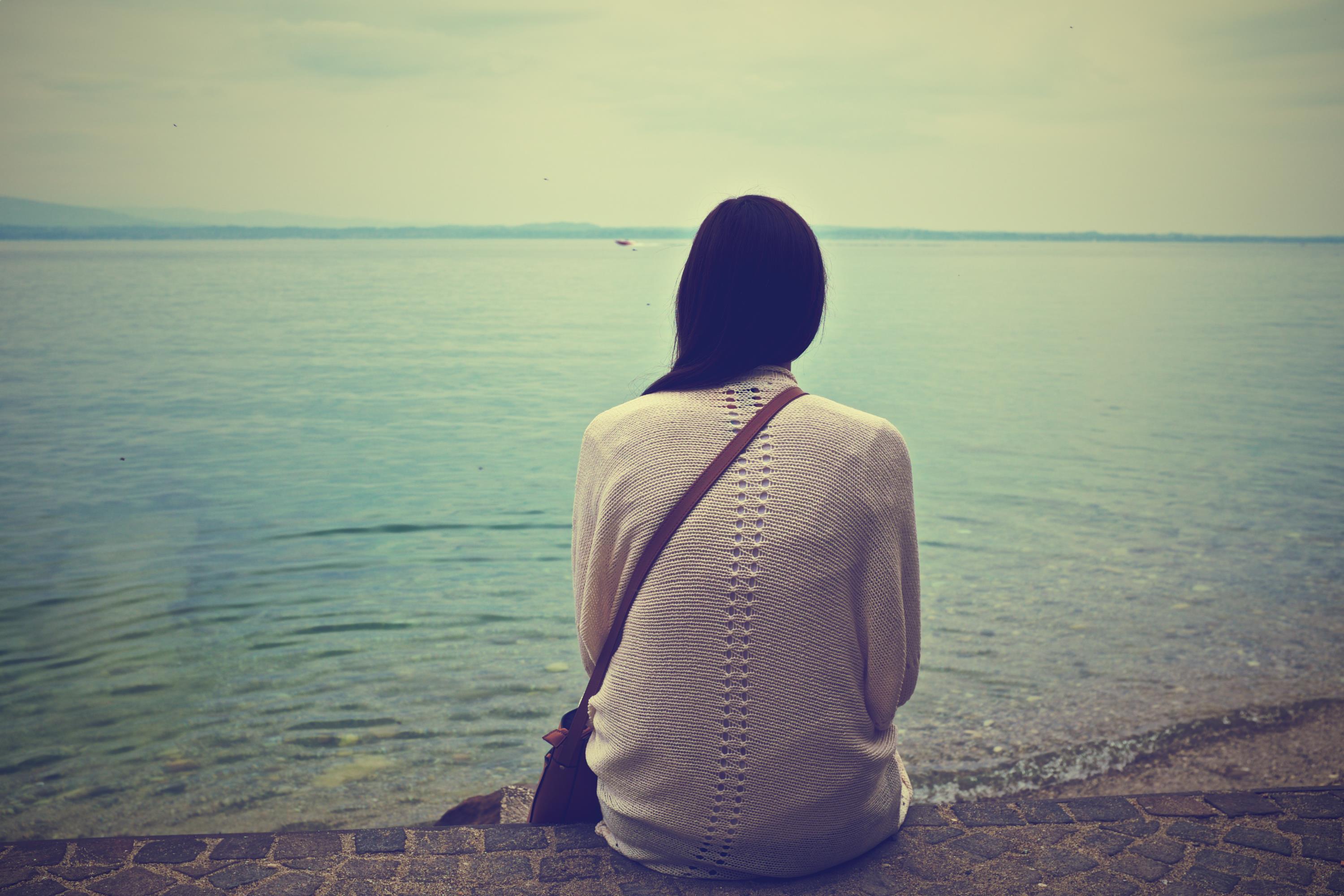 Girl Sitting by Water_Stocksnap_Dave Meier