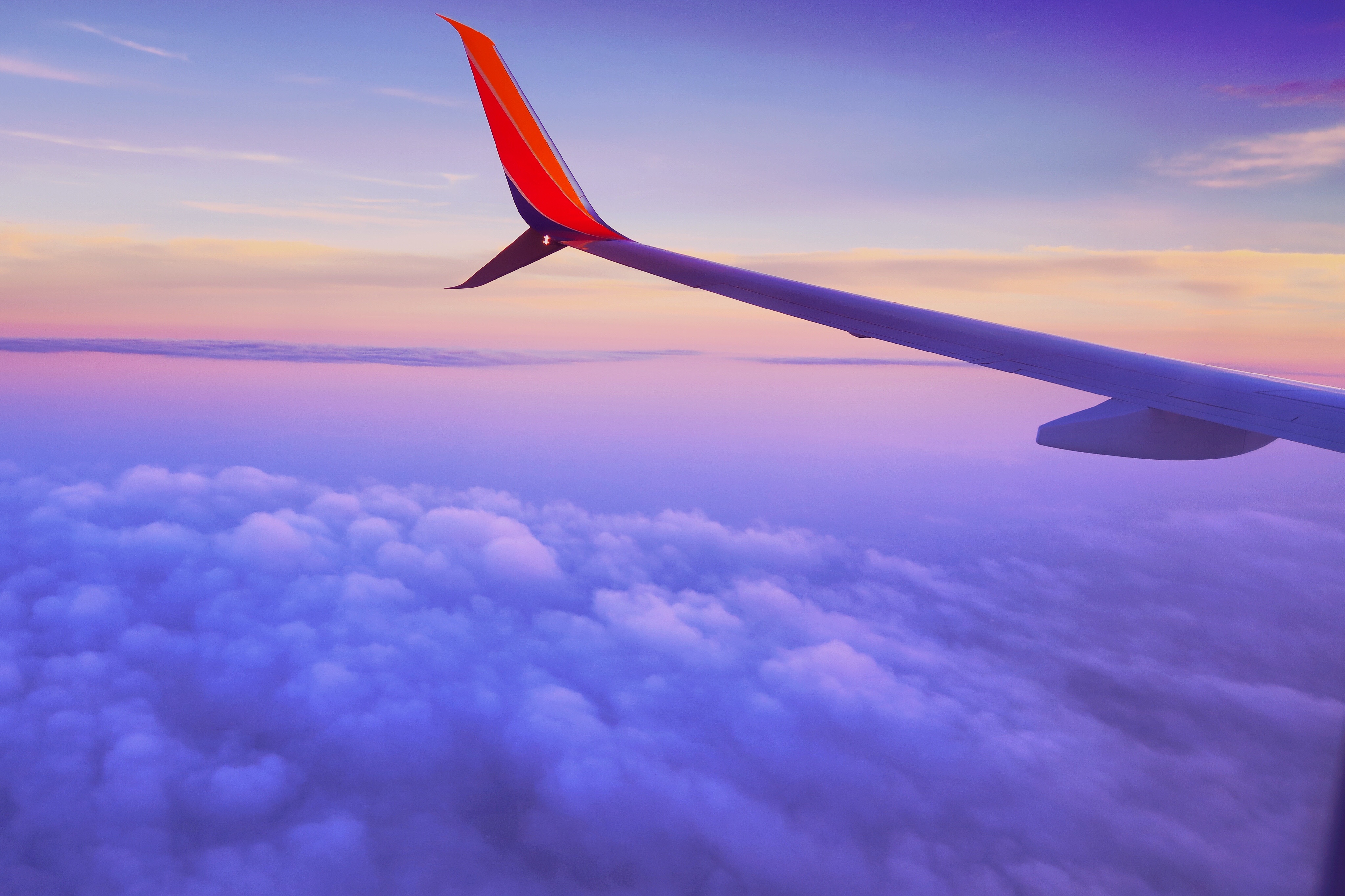 Plane wing sunset_Louis Magnotti_Stocksnap