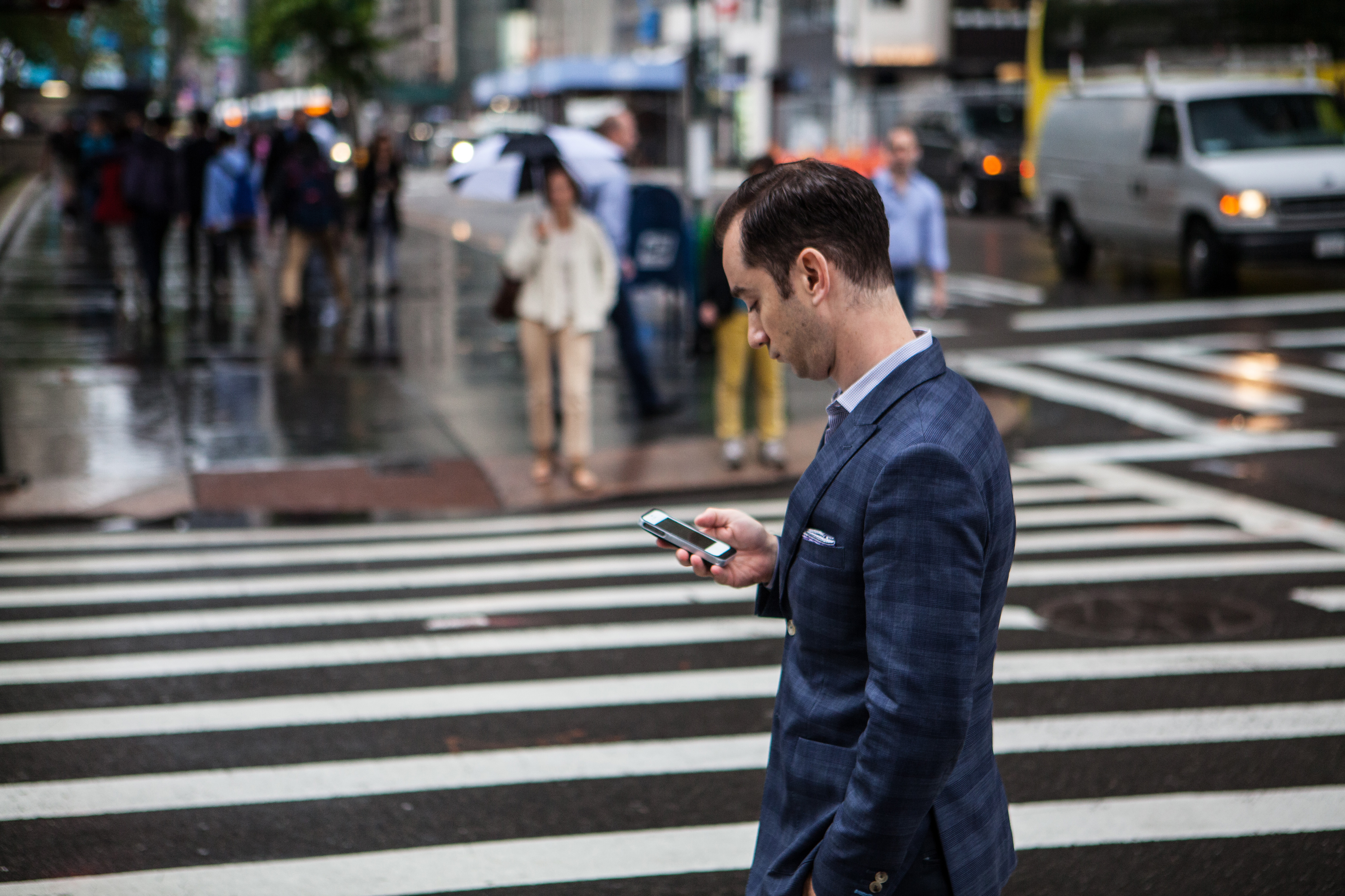 Guy in street on phone_ISO Republic