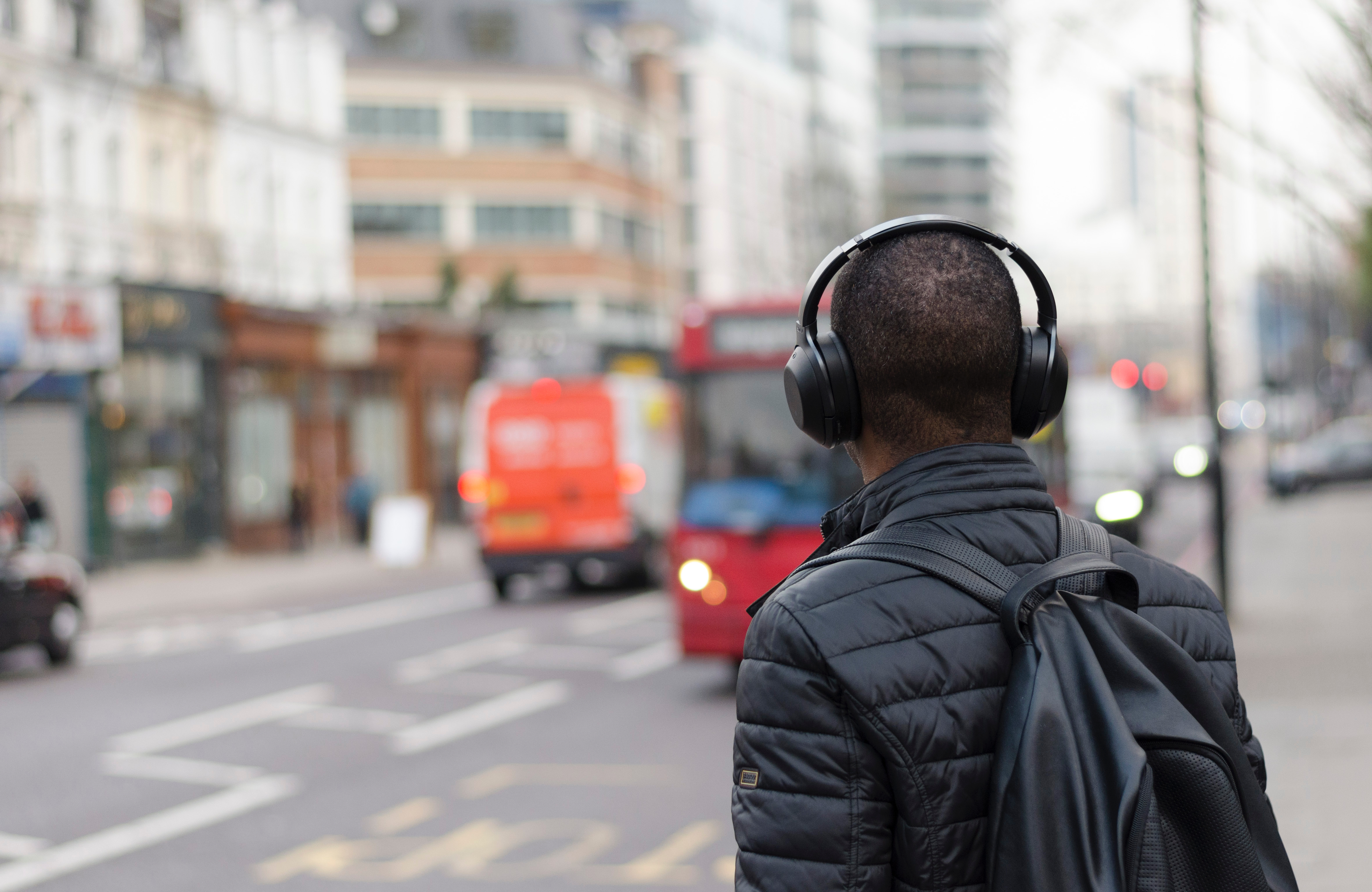 Headphones crossing street_Henry Be